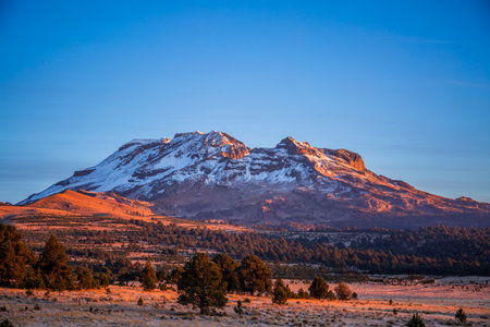 Iztaccihuatl Volcano (Sleeping Woman). is an inactive volcano located on the border between the State of Mexico and Puebla, within the IztaccÃ­huatlâPopocatÃ©petl National Park.の写真素材
