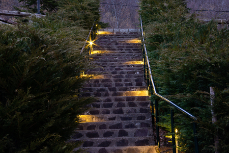 Purple cold stone stairs lighten by yellow warm lightsの写真素材