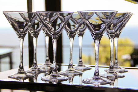 Cocktail glasses by the seaの写真素材