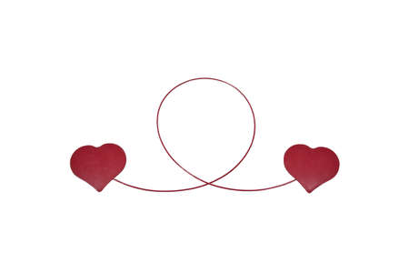Two red hearts attached by a red line isolated in withの写真素材