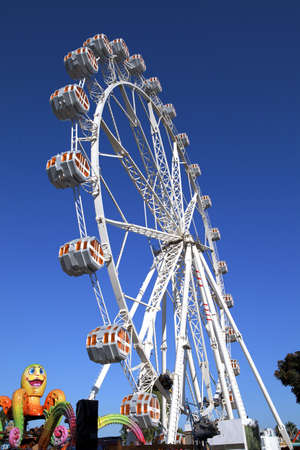 Summer day in circus, ferris wheelの写真素材
