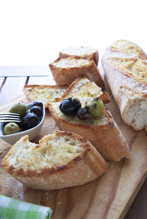 Close up of bread with olivesの写真素材