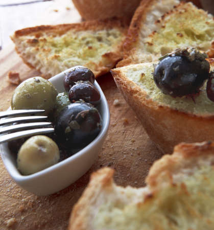 Close up of bread with olivesの写真素材