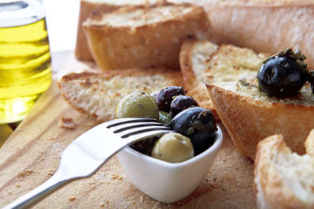 Close up of bread with olivesの写真素材