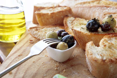 Close up of bread with olivesの写真素材
