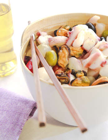 Fresh salad delicious seafood in a modern cupの写真素材