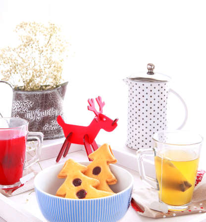 Candid breakfast with sweet pastries with a shape of a treeの写真素材