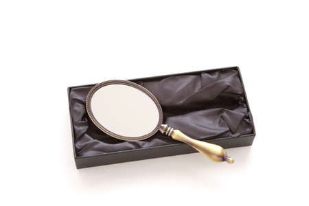 Hand mirror isolated on witheの写真素材