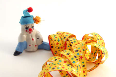 a funny clown in a colorful backgroundの写真素材