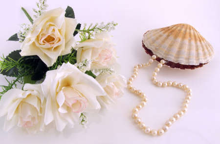 A pearl necklace going out from a shellの写真素材
