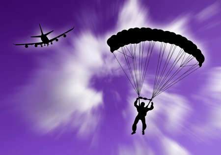 Parachutist falling in the sky with plane on the backgroundの写真素材