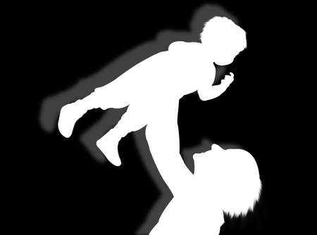 Mother and her son in silhouette as symbol familyの写真素材