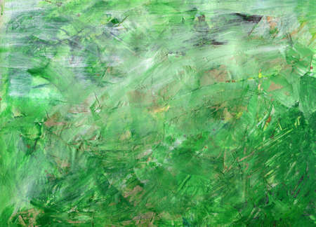 Abstract background of green color with stains and scratches.の写真素材