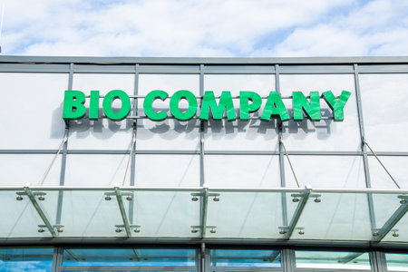 Potsdam, Brandenburg/Germany - 24.03.2019: The logo of the Bio Company, an organic specialty shop in Potsdam in green on a facadeのeditorial素材
