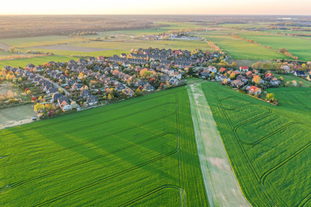 Falkensee, Brandenburg/Germany - 15.04.2019: An aerial photograph of Seeburg, showing the trace left by the laying of a pipe across a field for tracks in the form of a stripe.のeditorial素材
