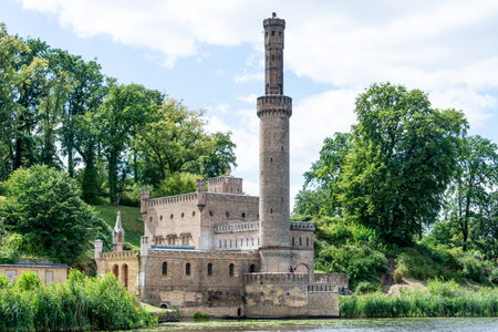 Potsdam, Brandenburg/Germany - 07.23.2018: Steam engine house from Park Babelsberg photographed from the water.のeditorial素材