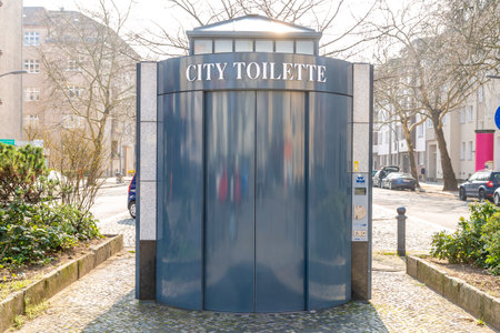 Berlin, Berlin/Germany - 23.03.2019: A toilet house in Berlin, which was set up by the company Wall and cannot be used for free.のeditorial素材