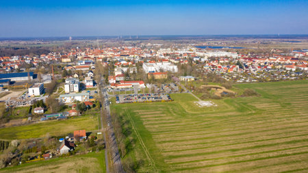 Nauen, Brandenburg/Germany - 26.03,2020: The city of Nauen photographed from the air with the hospital Havellandklinik and the helicopter landing pad in the centre of the picture.のeditorial素材