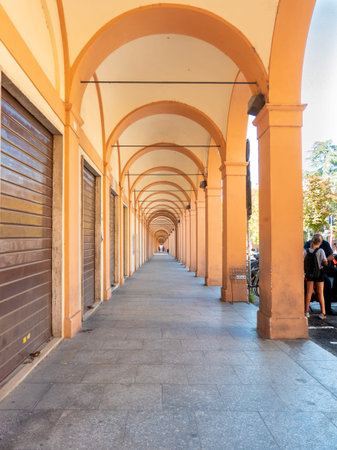 Bologna, Emilia-Romagna / Italy - 08/19/2020: A footpath in one of the countless arcades in Bologna...