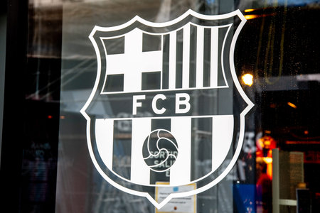 Barcelona, Catalonia, Spain - 09-02-2021: Transparent FC Barcelona logo on a backlit pane with...