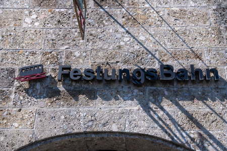Salzburg, Salzburg - Austria - 06-17-2021: The logo and text of the Fortress Railway in Salzburg...