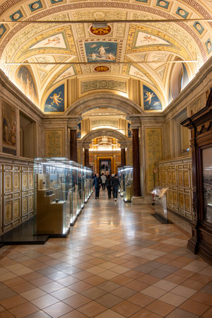 CittÃ  del Vaticano, Vaticano - Stato della CittÃ  del Vaticano - 11-22-2022: An opulent corridor adorned with artwork guides visitors through the Vatican Museumsのeditorial素材