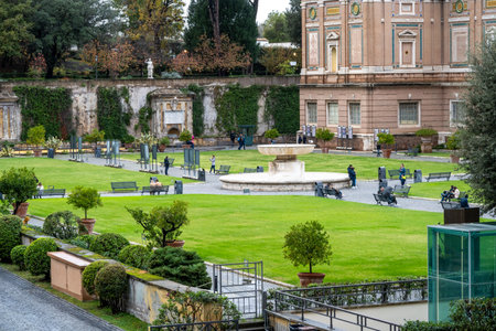 CittÃ  del Vaticano, Vaticano - Stato della CittÃ  del Vaticano - 11-22-2022: Lush greenery and tranquil fountain offer a peaceful retreat within the Vatican Museum's gardensのeditorial素材