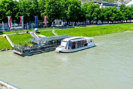 Salzburg, Salzburg - Austria - 06-18-2021: Sunny Salzach Cruise Dock in Salzburg, Austria,...