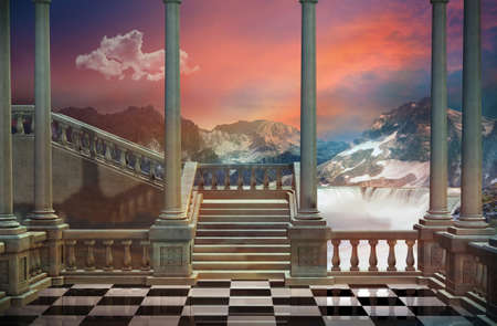 View of a castle balcony and a beautiful landscape with mountains and waterfallの写真素材