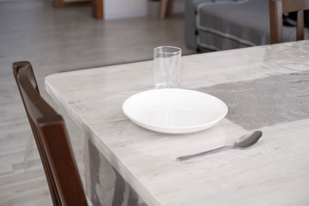 Serving a plate on the table at home.の写真素材