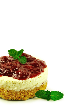 Strawberries cheese cakes close up isolated on white background.の写真素材