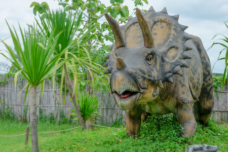 triceratops dinosaur forest model on background.の写真素材