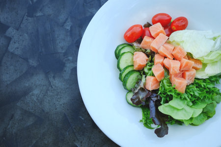 salmon healthy salad on background.の写真素材