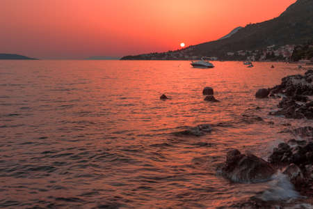 Seascape with beautiful sunset over Adriatic seaの写真素材