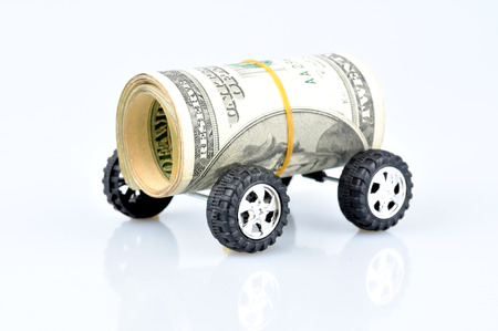 Money Car on the white background.の写真素材