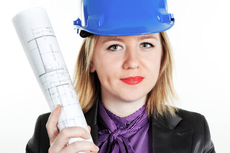 Attractive young engineer on the white backgroundの写真素材