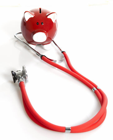 Red Piggybank with drugs. Investment health careの写真素材