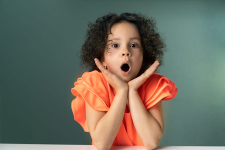 beautiful curly girl surprised
