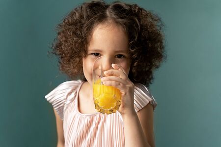 beautiful curly girl smilingの写真素材