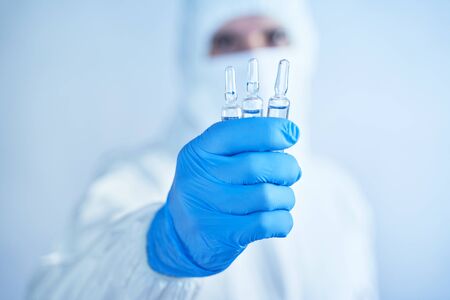 Search and testing of serum against the virus Covid-19.Global global pandemic of coronovirusの写真素材