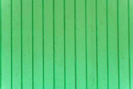 the surface of the wooden slats is painted green.の写真素材