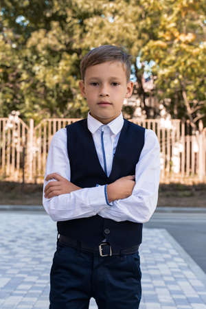 small smart beautiful school children came to school.の写真素材