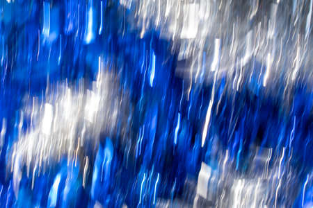 abstract festive golden blurred christmas bokeh background.の写真素材