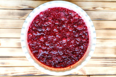 mixed with sugar fresh juicy ripe raspberries should give juice before pouring into cansの写真素材