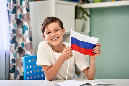 a beautiful boy with the flag of Russia. Russia Dayの写真素材