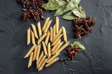 Italian food or ingredients background, pasta and spices. Top view, view from aboveの写真素材