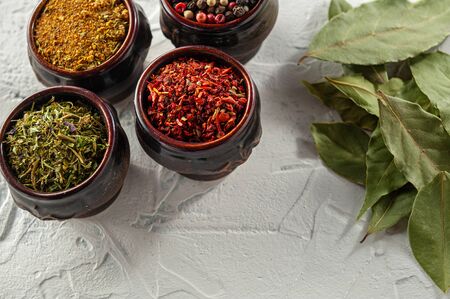 bay leaf, pepper and spice on white texture background top viewの写真素材