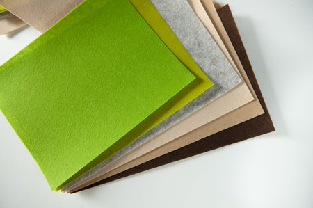 a set of felt fabrics. Lie on a light background
