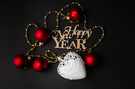 Composition of New Year,bright red-colored games and inscription with the new year