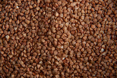 close-up buckwheat. Brown background. Close-up. grain structureの写真素材